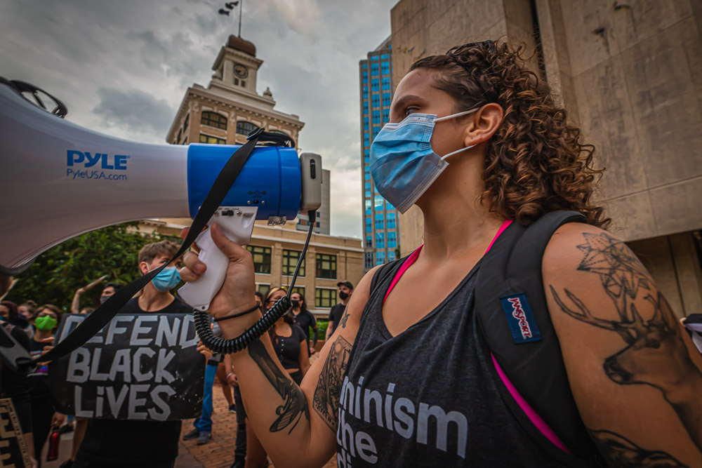 On the megaphone, Curtis Hixon
