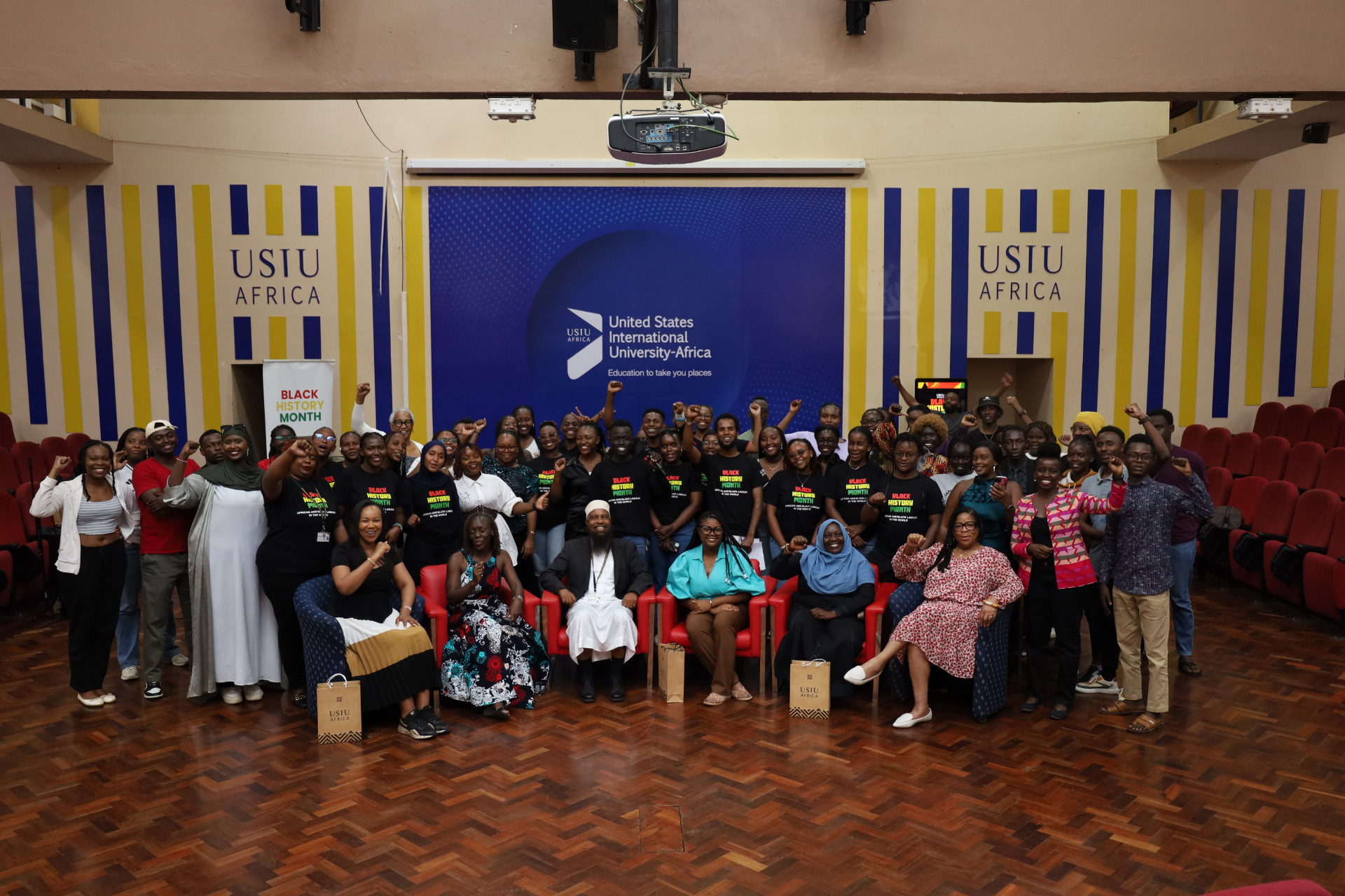 Charlea with USIU-Africa students at the Black History Month program in Nairobi.